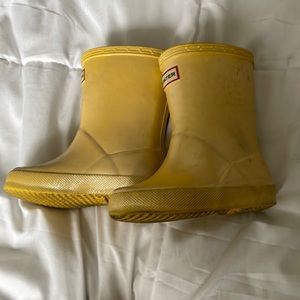 Yellow Hunter boots.